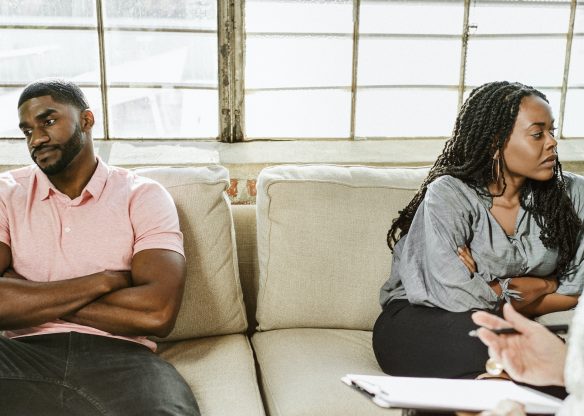 Black couple having a marriage counseling with therapist