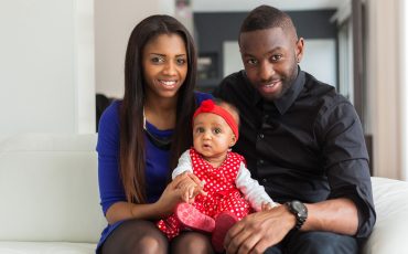 portrait-of-a-young-african-american-couple-with-her-baby-girl